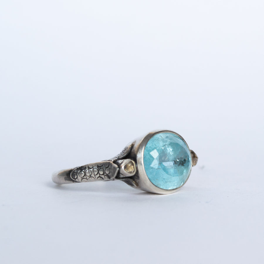 Faceted Aquamarine and Diamond ring